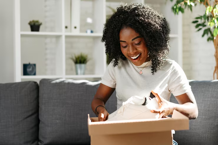 A couple opening a delivery together at home